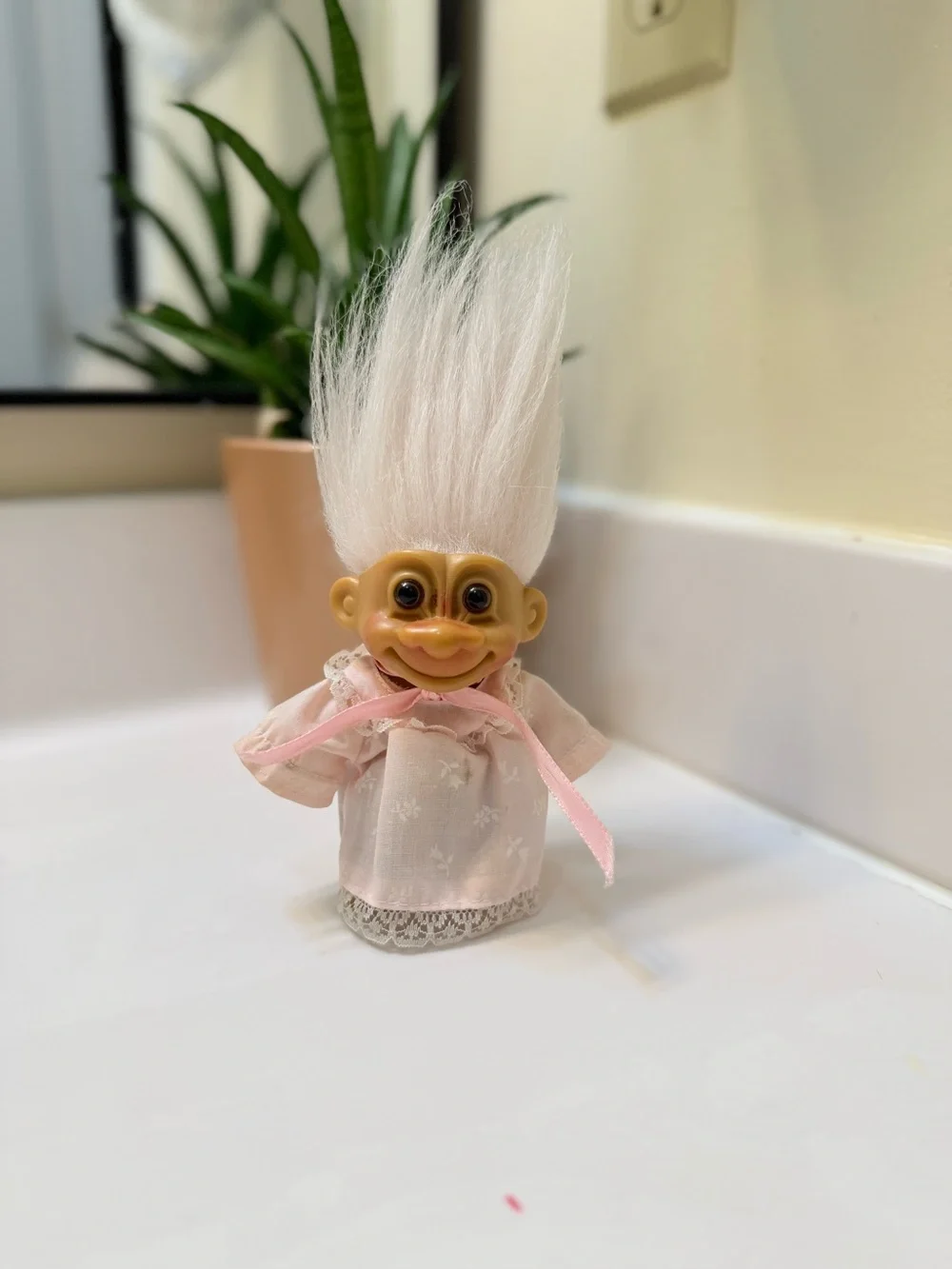 Russ Pink-Clad Baby Troll with White Hair Bath Toy